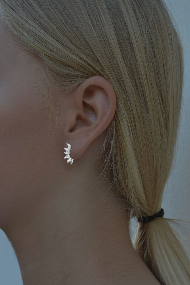 Six Spike silver earrings by Annika Burman