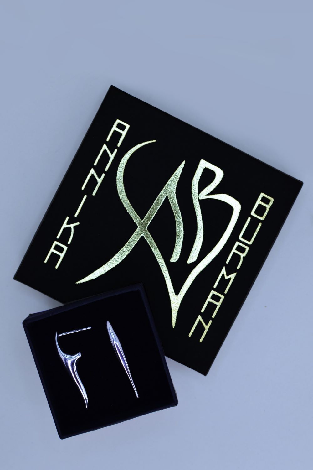 Flat Tusk Silver Earrings