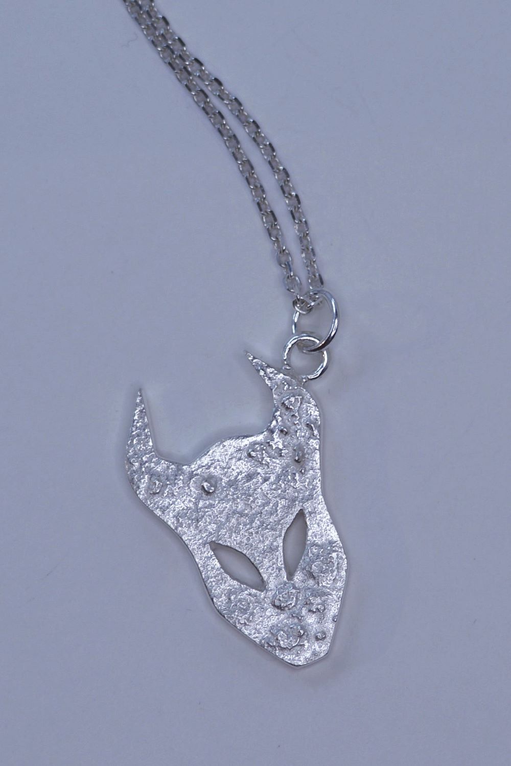 large demon silver pendant by Annika Burman jewellery - grey