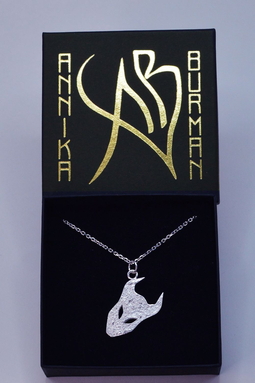 large demon silver pendant by Annika Burman packaging