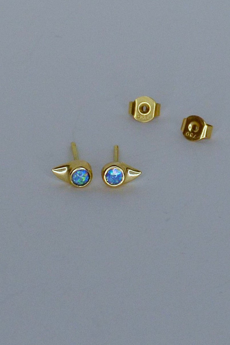 lynx gold and opal stud earrings by Annika Burman