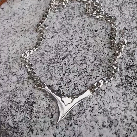 Shark Necklace in textured silver with a flat curb chain from The Blade Collection by Annika Burman