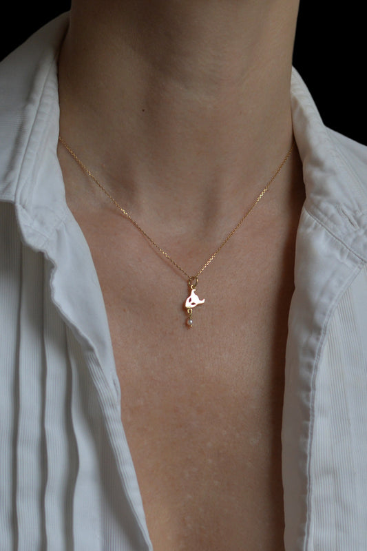 Demon pendant necklace in 18ct gold with pearl by Annika Burman