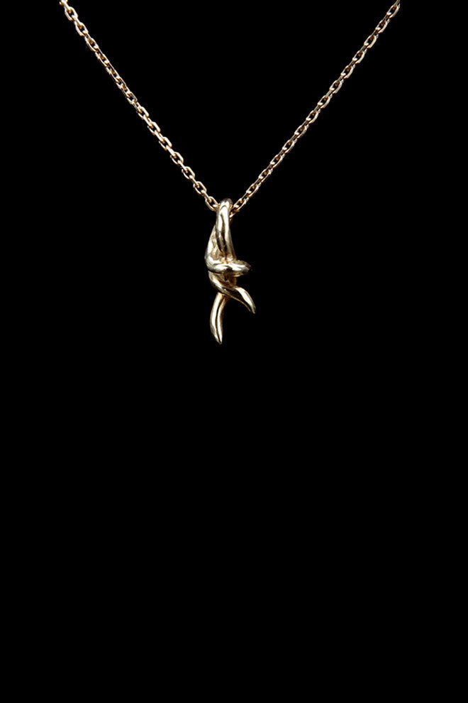 knot pendant necklace in 18ct gold by Annika Burman
