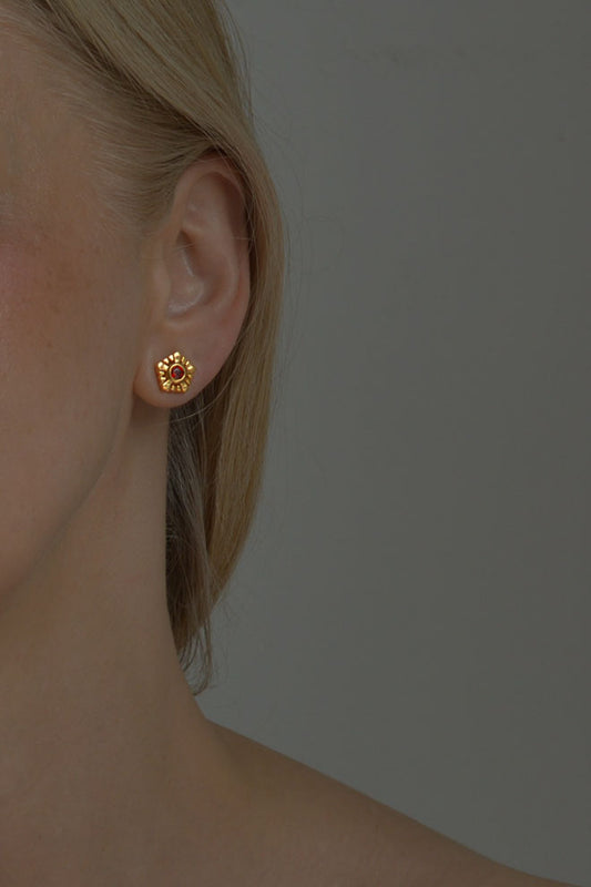 Helia stud earrings in gold vermeil with garnets by Annika Burman