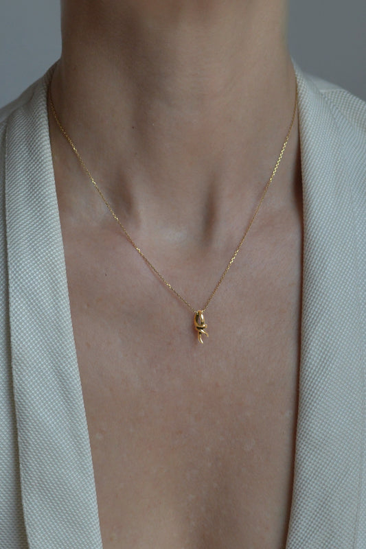 knot pendant necklace in 18ct gold by Annika Burman