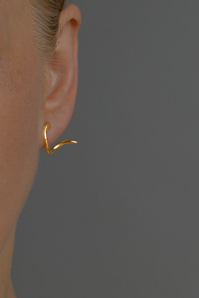 Rebel gold hoop earrings by Annika Burman