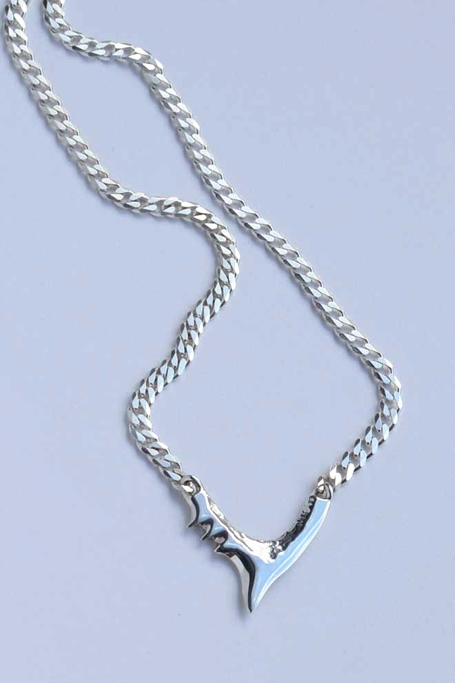 Shark Curved silver necklace by Annika Burman