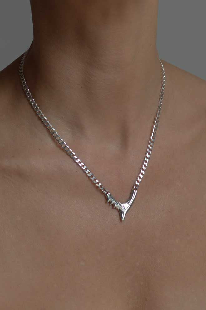 Shark Curved silver necklace by Annika Burman