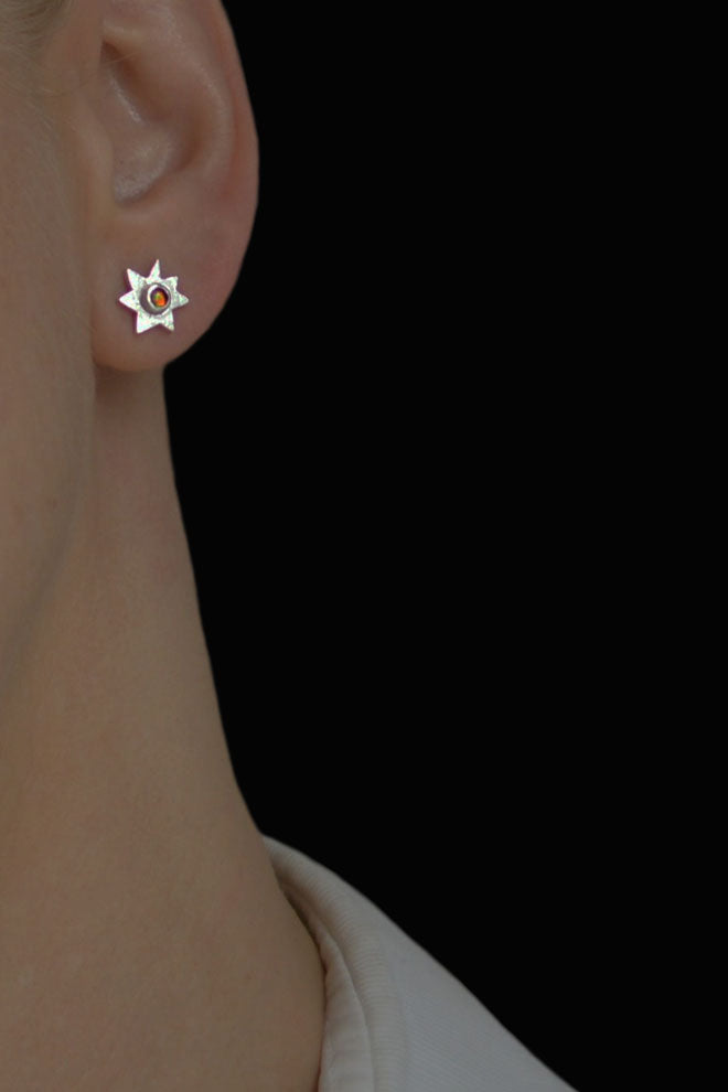 Star stud earrings in silver with opals by Annika Burman
